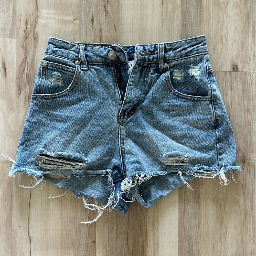 Princess Polly high waisted distressed jean shorts